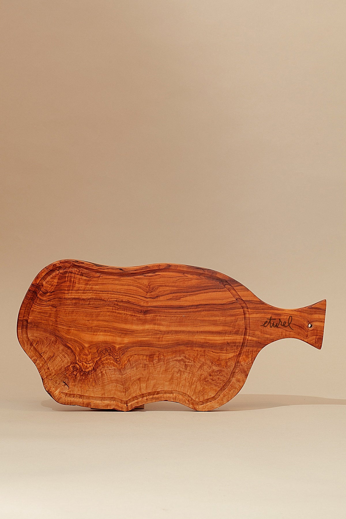 Tabla de madera de olivo con mango · Mediana